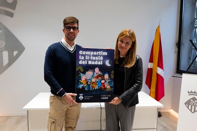 L’alcaldessa i el regidor de promoció i dinamització cultural amb el cartell de Nadal (foto. Ajuntament de Rubí – Localpres).